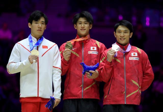 天天盈球官网-张博恒憾负桥本大辉摘银 全能双子星之争未来可期